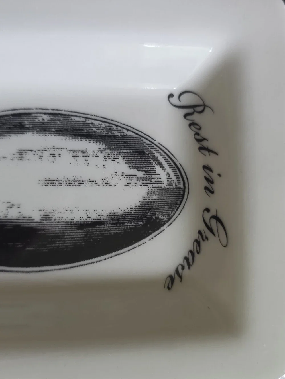 Fishs Eddy White Ceramic Spoon Rest with Black Spoon Illustration